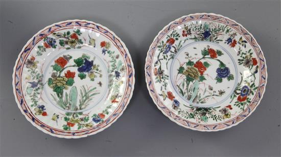 Two Chinese famille verte hexagonal cups and a pair of similar saucers, Kangxi period, 6.5cm and 13.5cm, faults